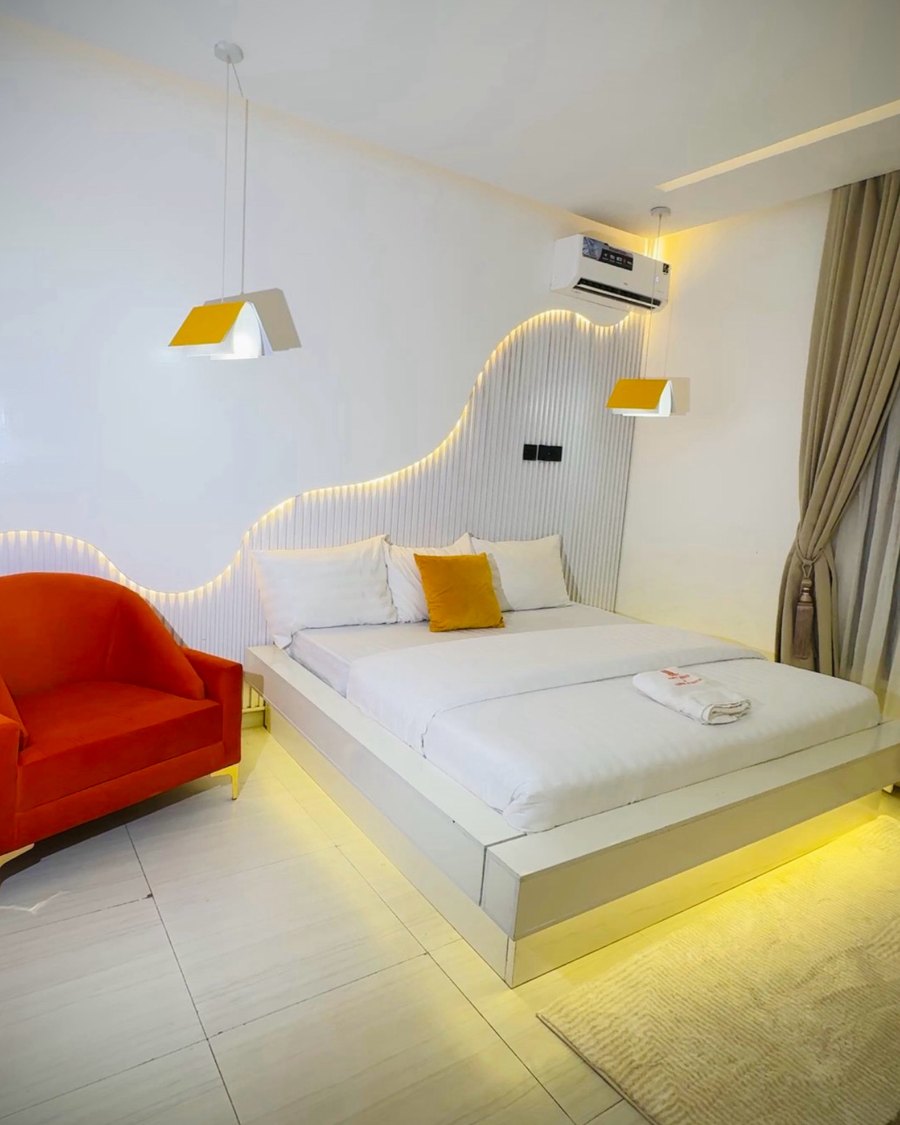 A wave of light above the bed.